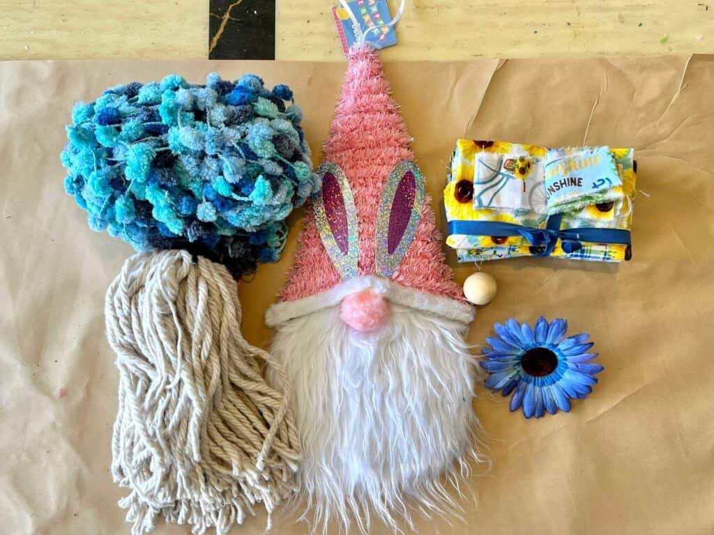 Supplies needed to makeover a Dollar Tree easter bunny gnome into a sunflower gnome.