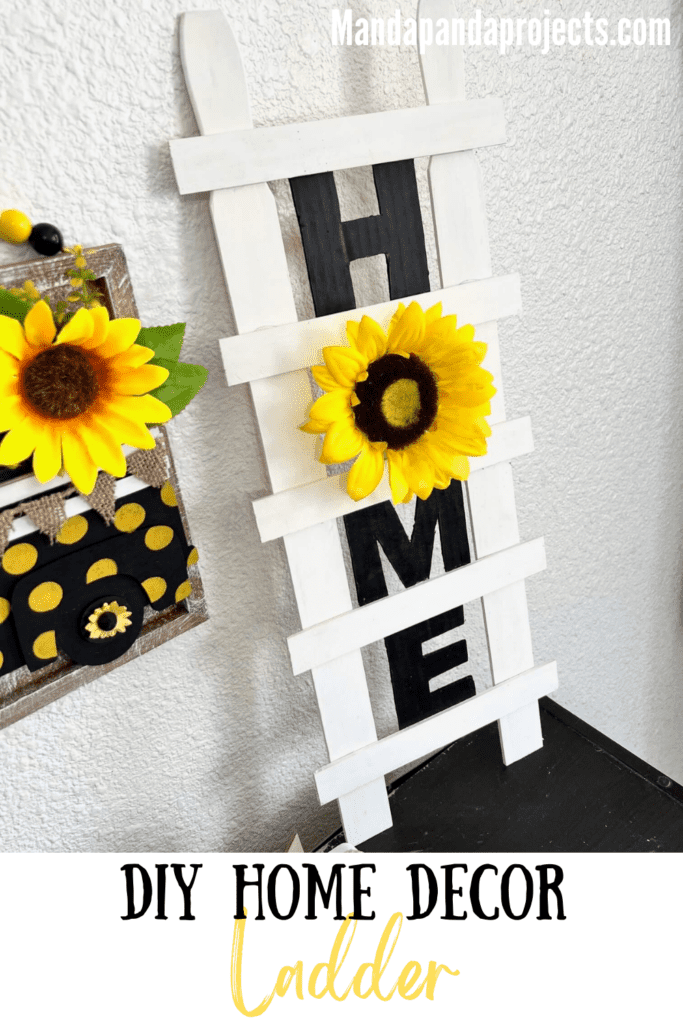 DIY Paint Stick Decor Ladder with the word HOME and a sunflower "O" for easy and affordable way to decorate your home on a budget.