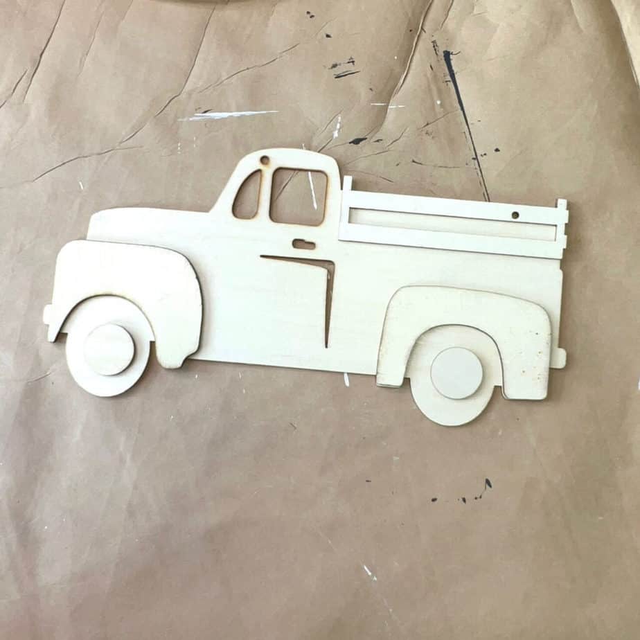 Dollar tree raw wooden truck before it was painted.