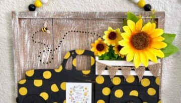 DIY Dollar Tree Sunflower Truck made with Dollar Tree supplies, faux sunflowers, a honey bee, wood bead hanger, and black with yellow polka dots for spring and summer DIY affordable decor.