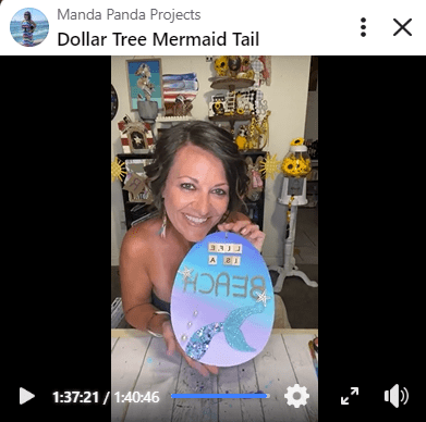 Amanda holding the completed project on a Facebook live thumbnail.