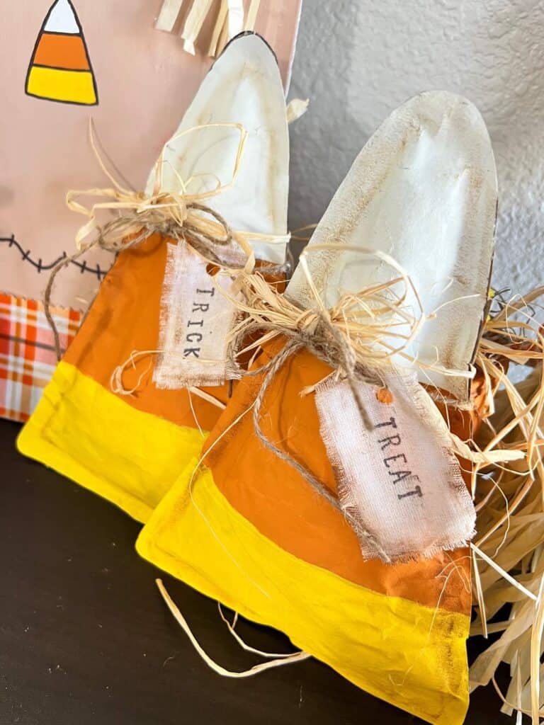 Brown Kraft Paper Candy Corn DIY Fall crafts and decor for Halloween decorations with orange yellow and white theme and trick and treat hang tags.