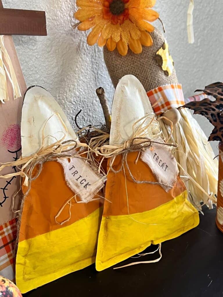 Brown Kraft Paper Candy Corn DIY Fall crafts and decor for Halloween decorations with orange yellow and white theme and trick and treat hang tags.