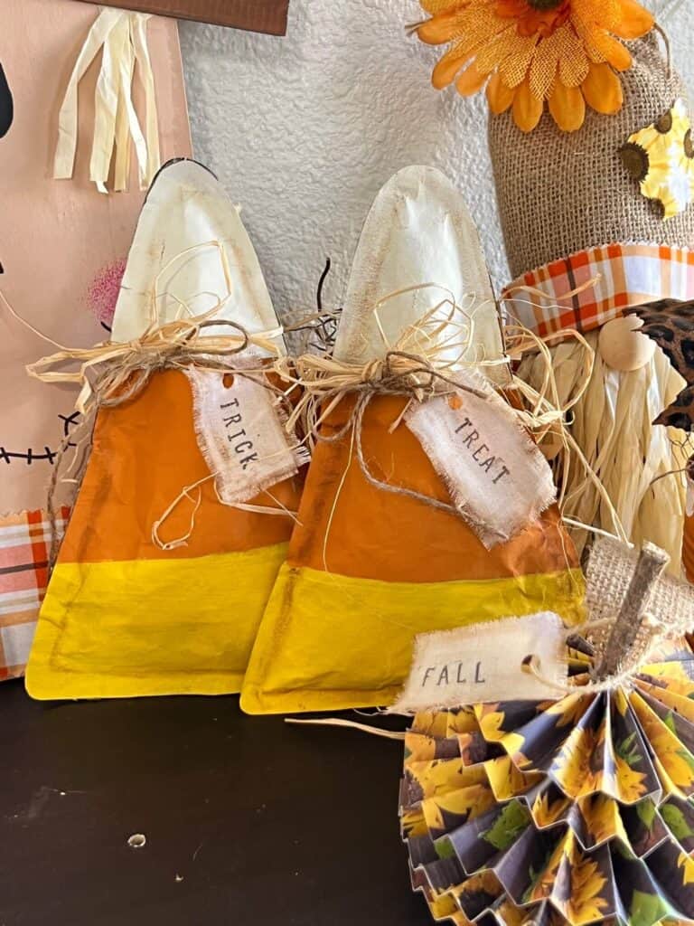 Brown Kraft Paper Candy Corn DIY Fall crafts and decor for Halloween decorations with orange yellow and white theme and trick and treat hang tags.