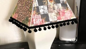 Thrift Store Lamp Flip. Makeover of a white lampshade with rice paper printables decoupaged onto the shade with black pom pom trim around the bottom and pearl strips up the side with pearl beads.