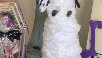Foam Cone Mummy easy affordable quick DIY Halloween Decor idea with a cute bow on top.