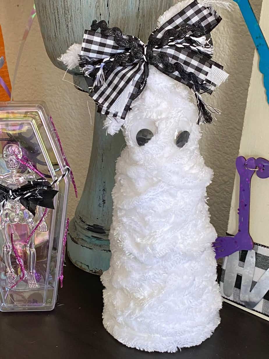 Foam Cone Mummy easy affordable quick DIY Halloween Decor idea with a cute bow on top.