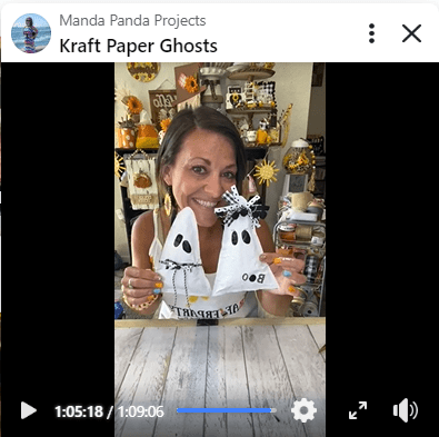 Amanda holding the completed ghosts on a Facebook live thumbnail.
