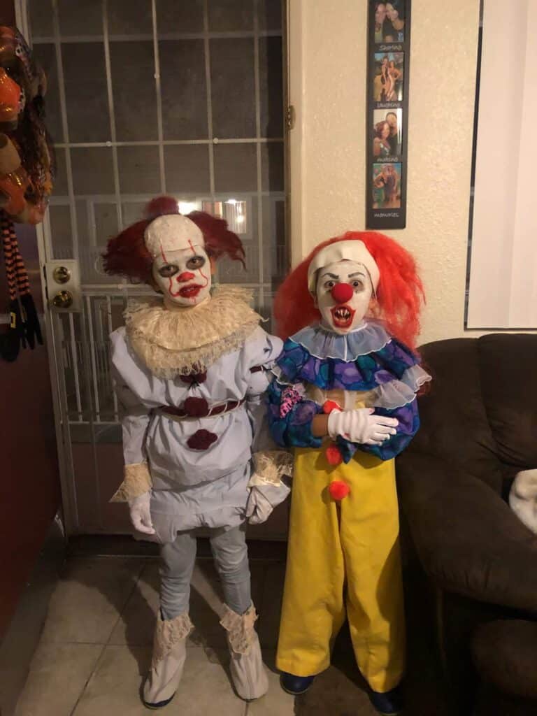 DIY Pennywise the Clown Halloween costumes with the original version of pennywise, the new movie version. 2 different handmade costumes with 2 kids wearing them.