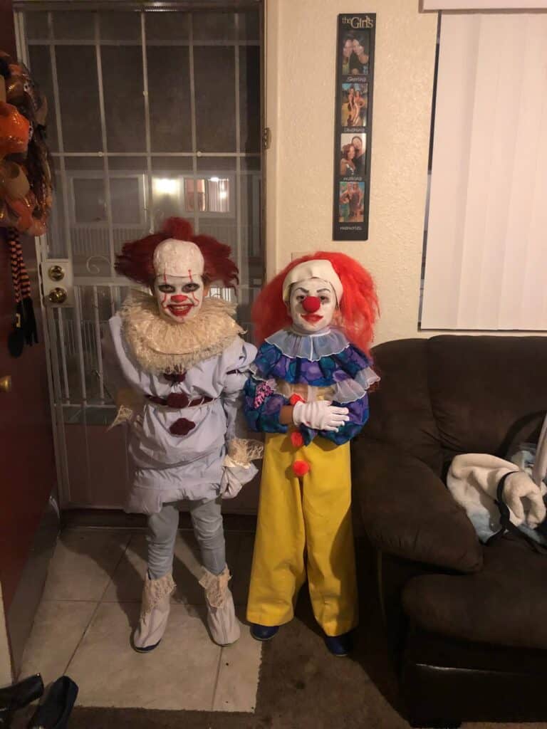 DIY Pennywise the Clown Halloween costumes with the original version of pennywise, the new movie version. 2 different handmade costumes with 2 kids wearing them.