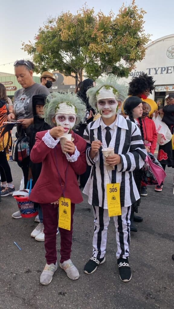 DIY Handmade Beetlejuice and Lydia Halloween costumes both the black and white striped suit and the maroon wedding suit made with thrift store clothes on a budget.