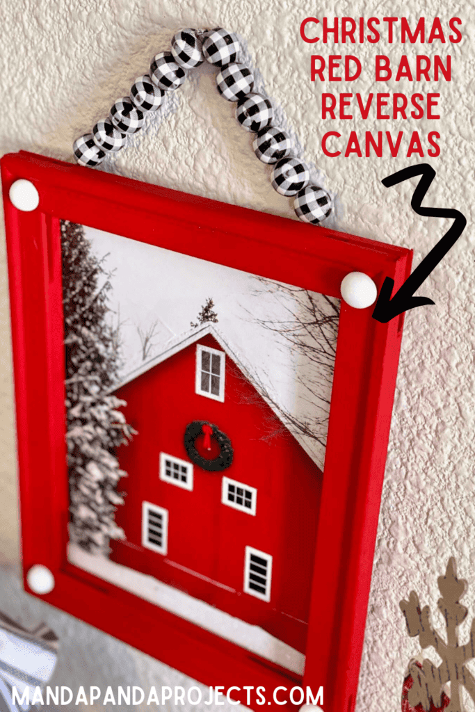 Dollar Tree reverse canvas with a Walmart Red Christmas Barn gift bag to make DIY affordable Christmas decor on a budget.