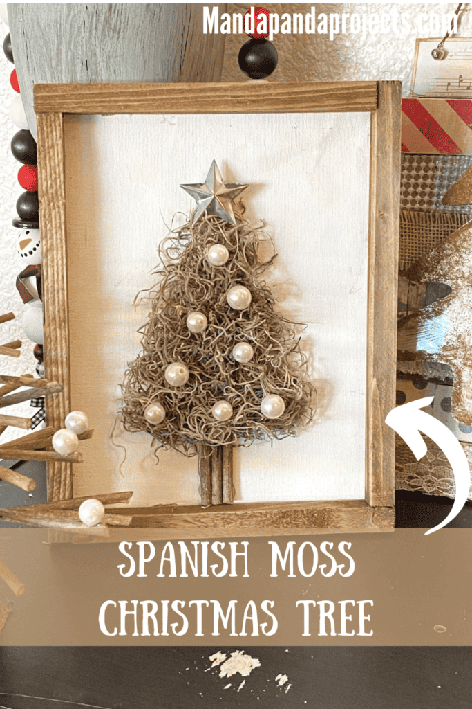 Spanish Moss Christmas Tree made with a Dollar Tree reverse canvas with pearl bead ornaments and a galvanized metal star topper.