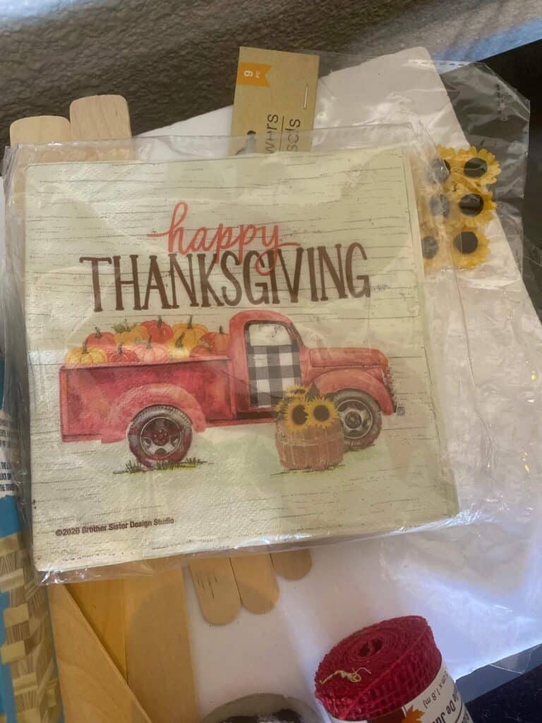 Pack of Happy Thanksgiving Truck napkin in the plastic wrapper.