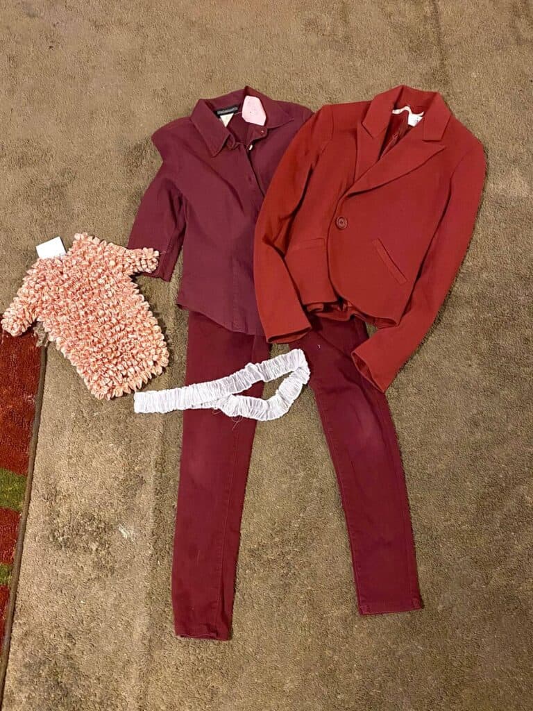 Maroon pants, jacket and shirt with a mauve ruffled shirt from the thrift store.