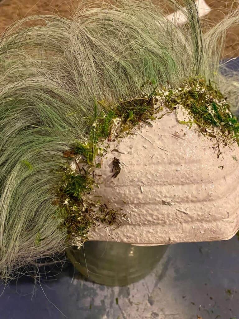 Closeup if the Beetlejuice wig showing the white liquid latex with the green moss on it.