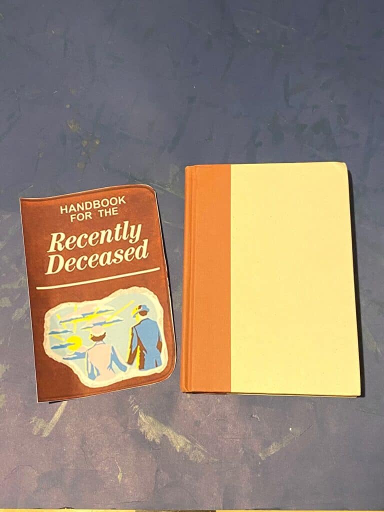 A thrift store book with a fake cover for the "Handbook for the recently deceased".