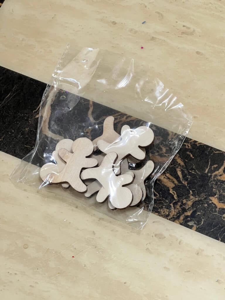 Bag of unpainted mini wooden Gingerbread men.