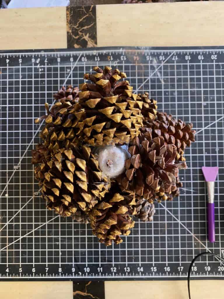 Birds eye view of the in progress pine cone christmas tree.