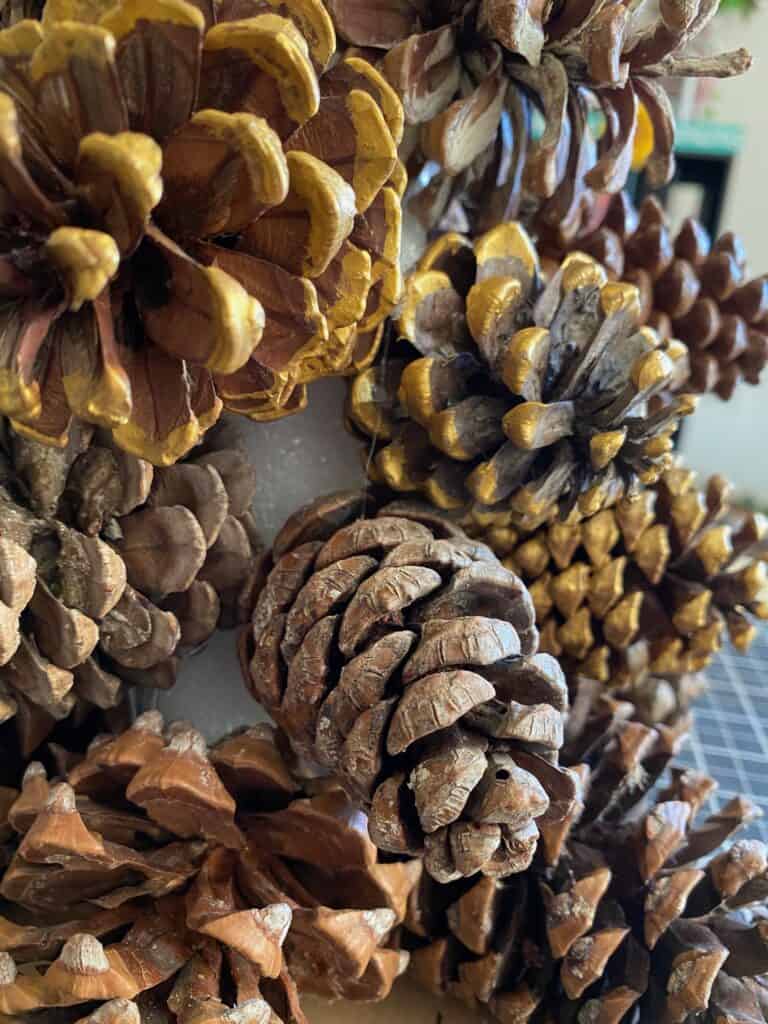 Close up showing the gaps in the pine cones where you can see the foam cone.
