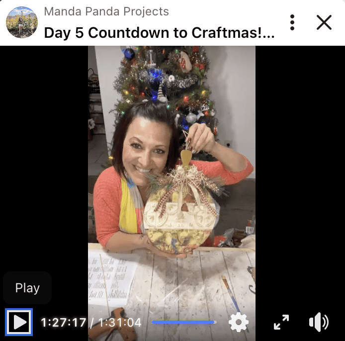 Amanda holding the completed project on a FB live thumbnail.