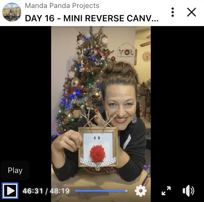 Amanda holding the completed project on a Facebook live thumbnail.