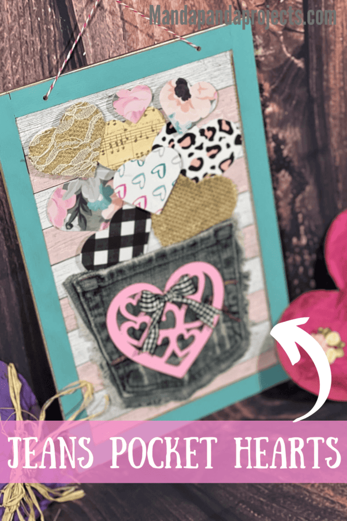 Jeans Pocket Valentines Day DIY Heart Decor with a dollar tree pink heart cutout, buffalo check bow, and small hearts floating out of the pocket with burlap, lace, and other scrapbook paper hearts.
