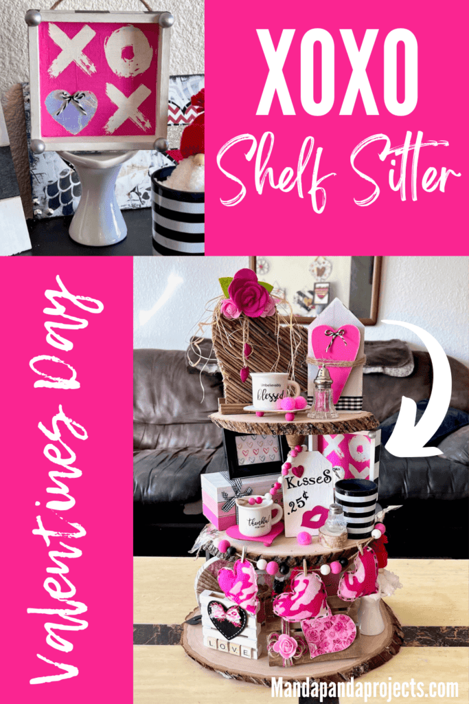 XOXO Valentines Day Napkin Shelf Sitter with a hot pink XOXO napkin that the second O is a silver heart, with a silver half wood bead on each corner and black and whit buffalo check print on each of the 4 sides of the box.