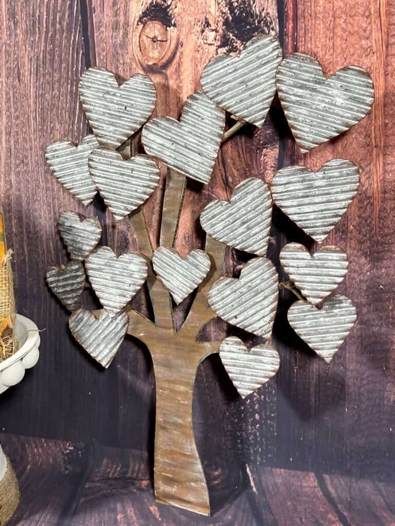 Faux Galvanized Metal Heart Tree decor made on a budget with cardboard as a copycat of Hobby Lobby decor. Corrugated cardboard painted silver with faux rust edges to look like metal.