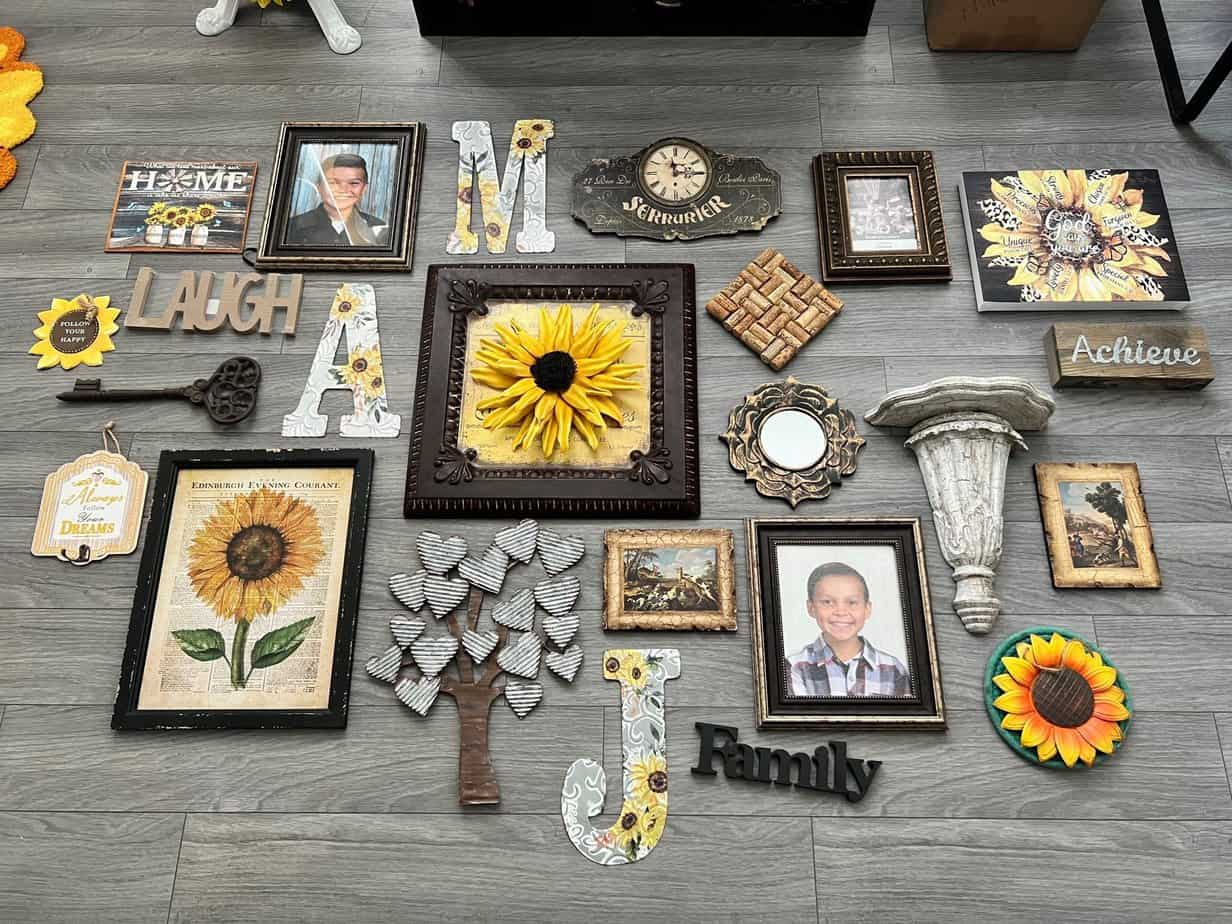 All of the decor pieces laid out on the floor before hanging them on the wall.
