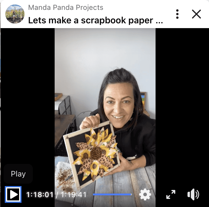 Amanda holding the completed project on a facebook live thumbnail.