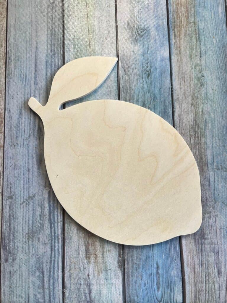 Plain wood lemon shape cutout.