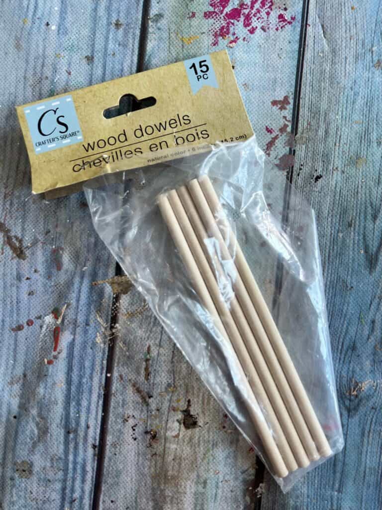 Wood dowels in a dollar tree package.