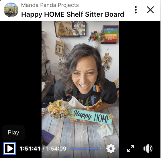 Amanda holding the completed project on a FB live thumbnail.