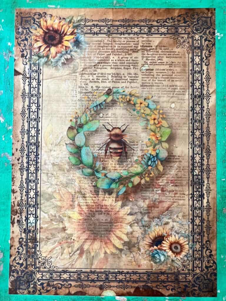 The center of the framed sign with the Sunflower Bee rice paper print Mod Podged to the center.