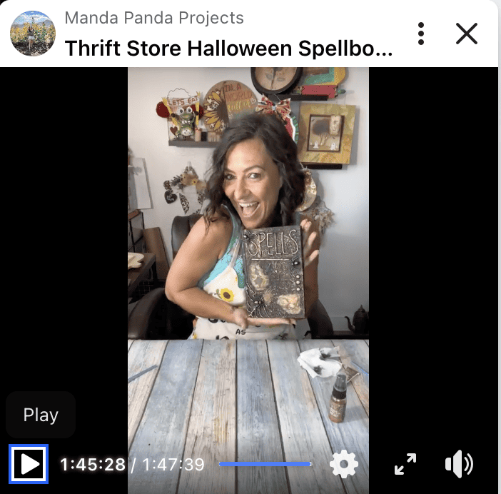 Amanda holding the completed craft on a Facebook live thumbnail.