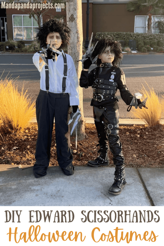 DIY Edward Scissorhands Costumes made with thrift store clothes and belts. Two different versions from the movie, one with black belted leather suit and one with grey pants, and white shirt with suspenders. Both wearing handmade scissorhands gloves and wild black wigs with scars on their faces and a pale complexion.