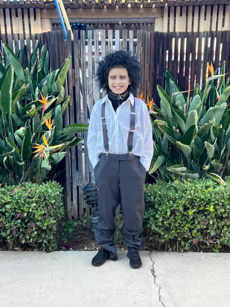 Maddox standing in the completed DIY Edward scissorhands Halloween Costume.