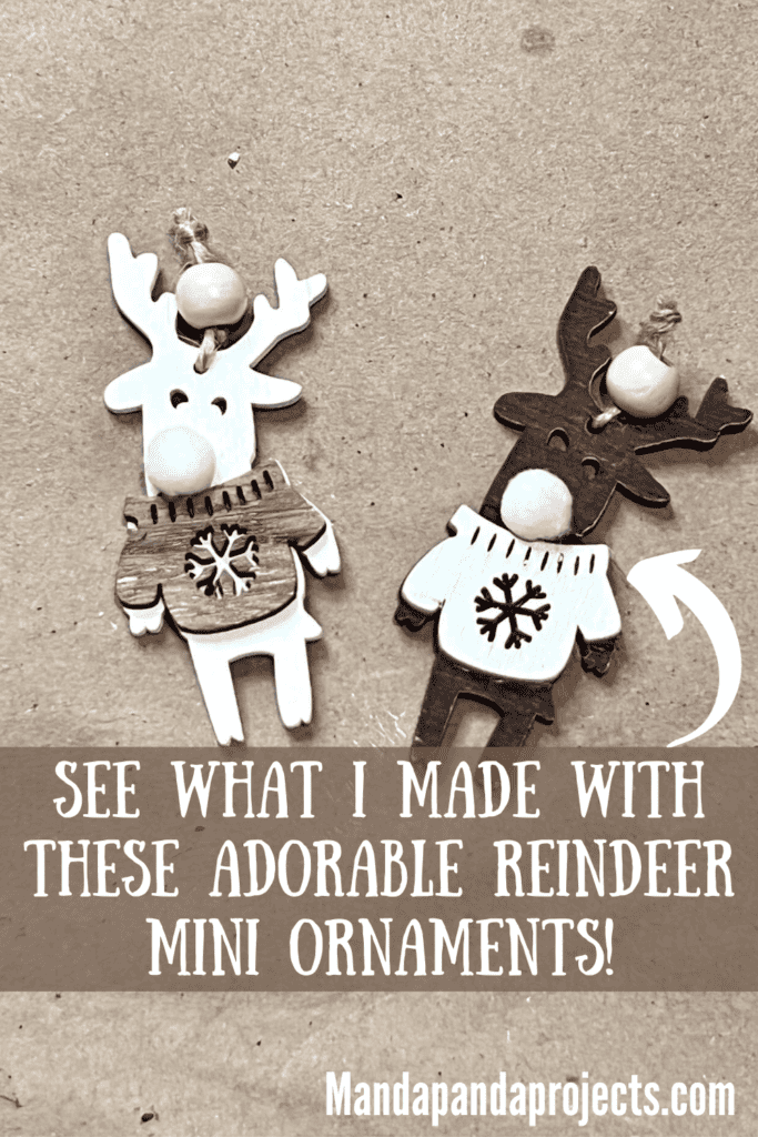 2 tan and brown neutral reindeer ornaments with white pom pom noses. A neutral version of rudolph the red-nosed reindeer.