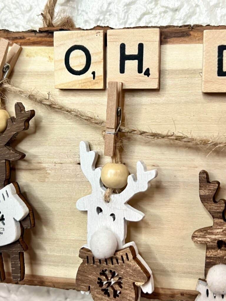 Close up of the mini reindeer hanging from a piece of twine with a mini clothespin