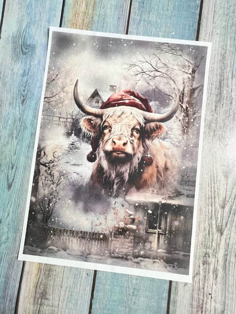 The highland cow christmas rice paper printed and sitting on a table.