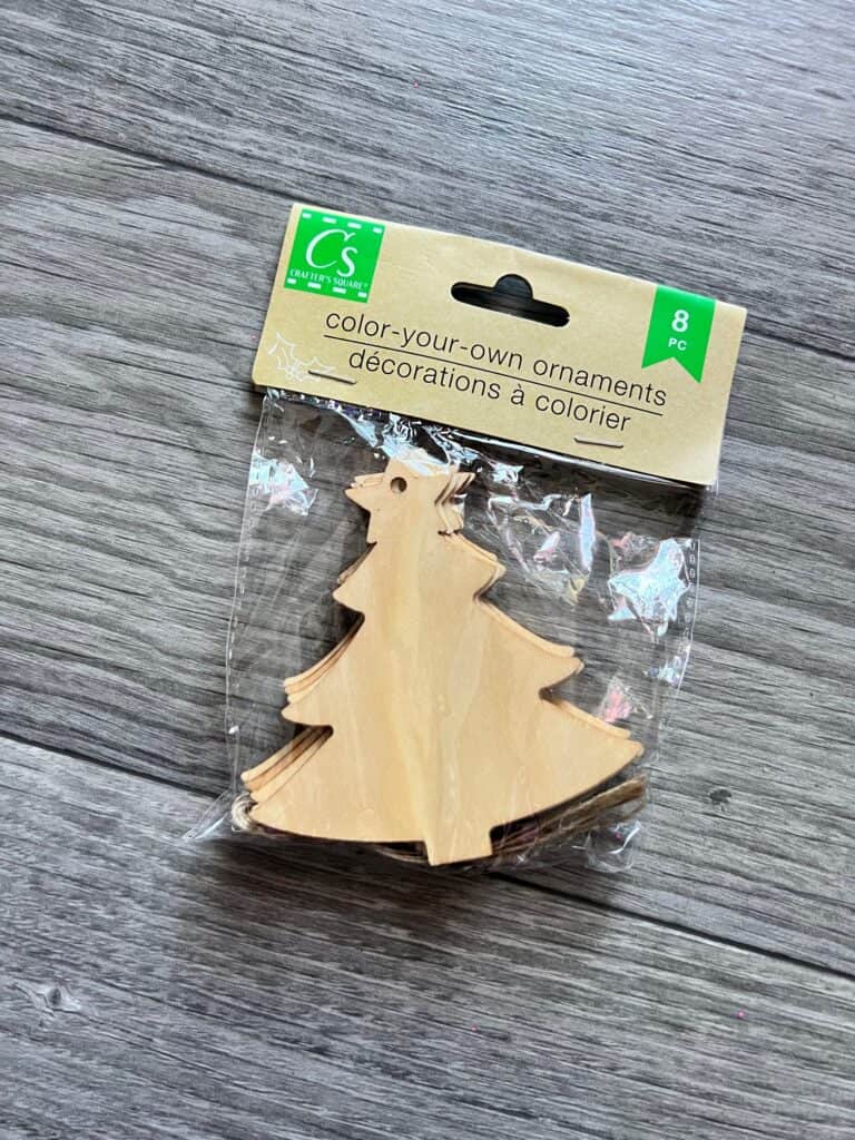 Pack of dollar tree wood Christmas trees.