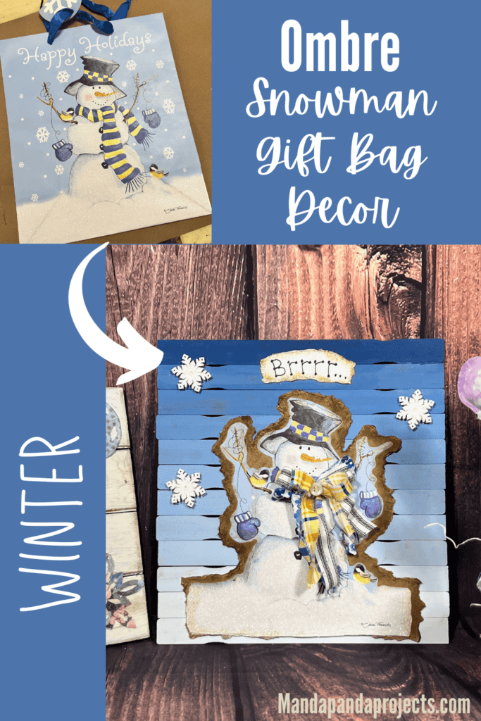 Ombre Snowman Gift Bag Decor with blue to white ombre paint stick background, a winter snowman gift bag with snowflakes around the snowman and a white sign at the top that says "Brrr" for winter decor.