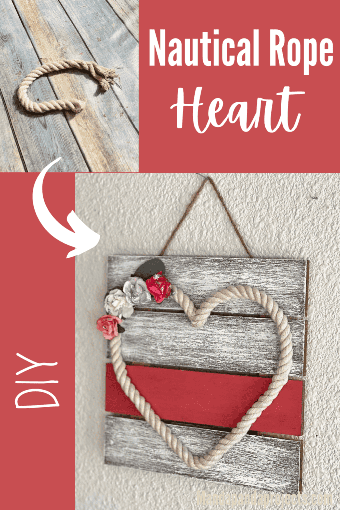 Wood Slatted background painted white and coral with a dollar tree nautical rope heart with pink, purple, and white faux flowers, for DIY valentines Day and everyday Home decor.