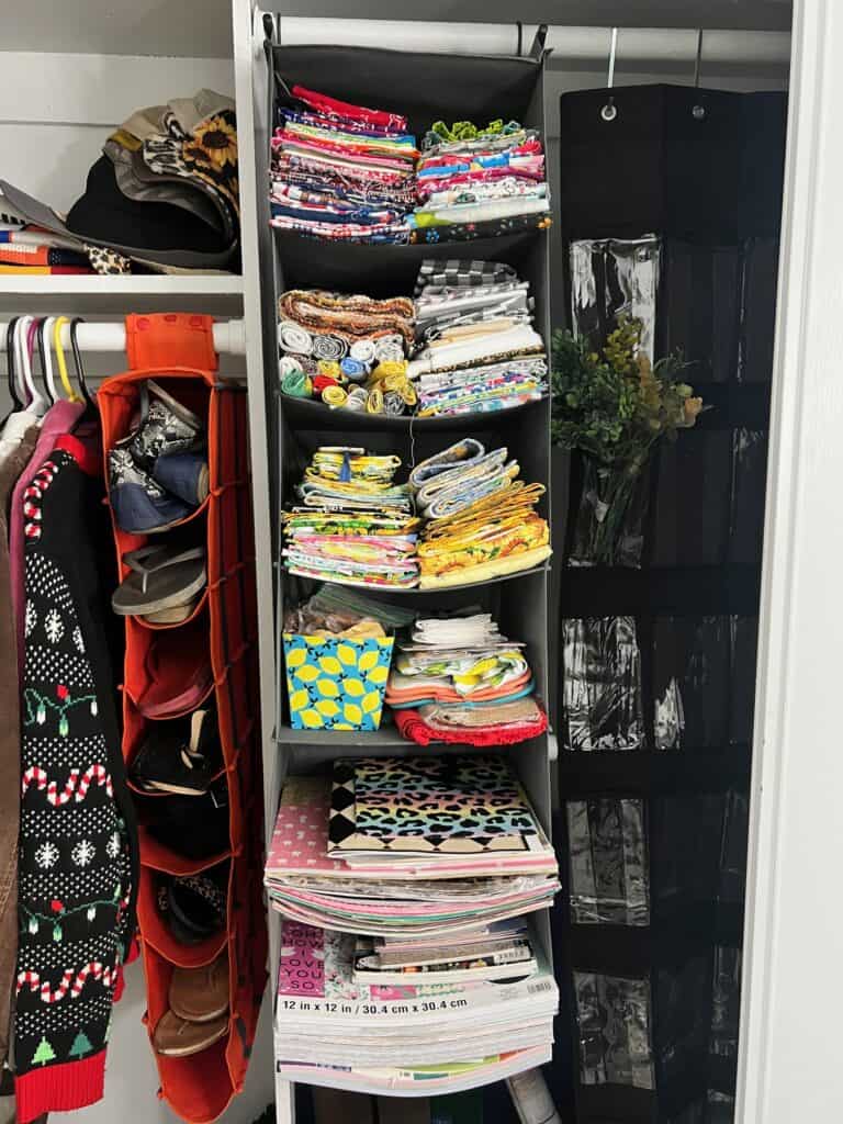 Vertical clothes drawers with fabric and other craft supplies.