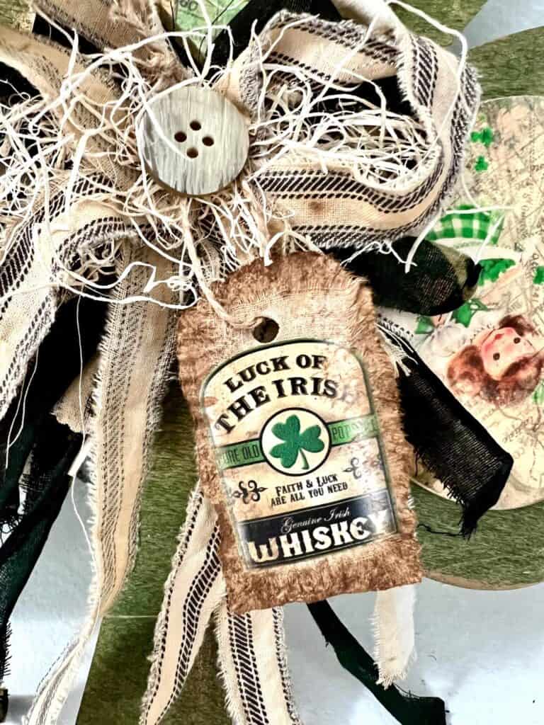 Kraft paper and muslin grunged up hangtag with "luck of the Irish" graphic.