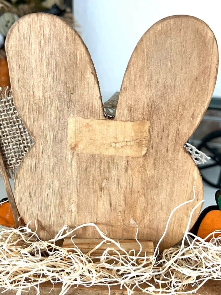 The back of the wood bunny head showing that it is stained brown with antique wax.