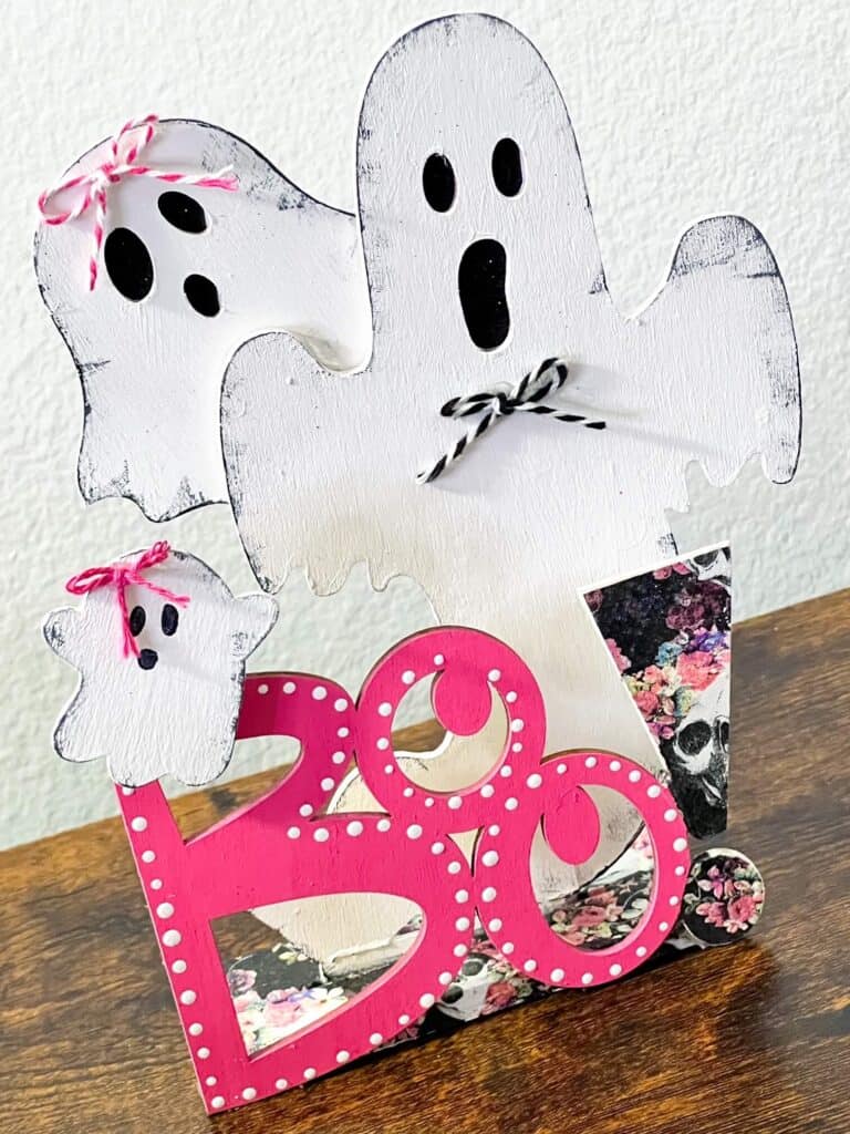 Dollar Tree Halloween Pink BOO Wood Ghost decor made with a floral skull napkin.