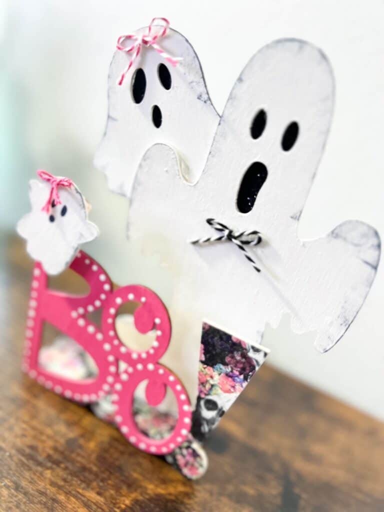 Dollar Tree Halloween Pink BOO Wood Ghost decor made with a floral skull napkin.