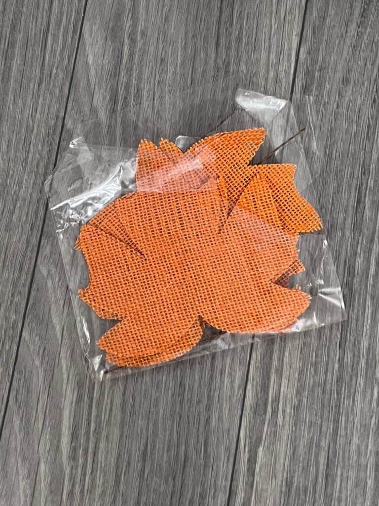 Orange burlap fall leaves.